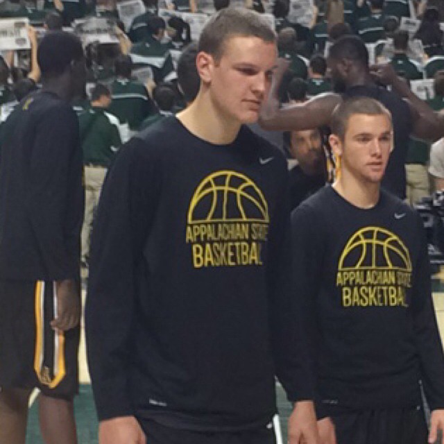 Tall guy warming up for basketball match