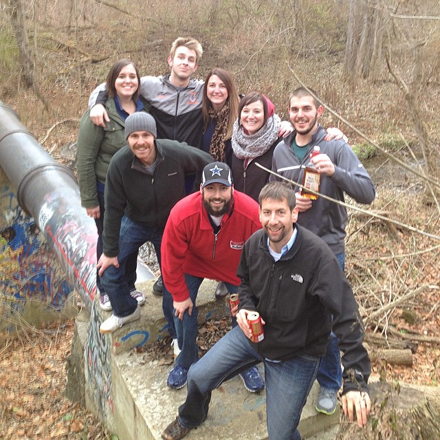 Jamison and family posting up on a sewage pipe in the woods