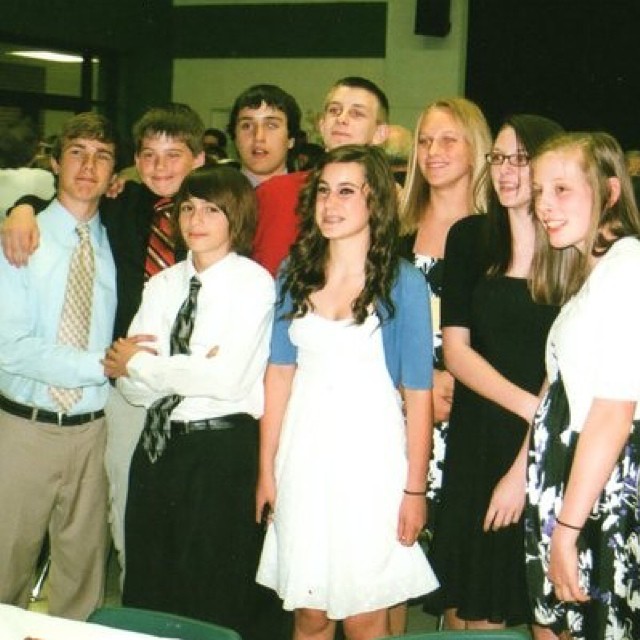 Young Jamison in formal attire at confirmation into the Catholic Church